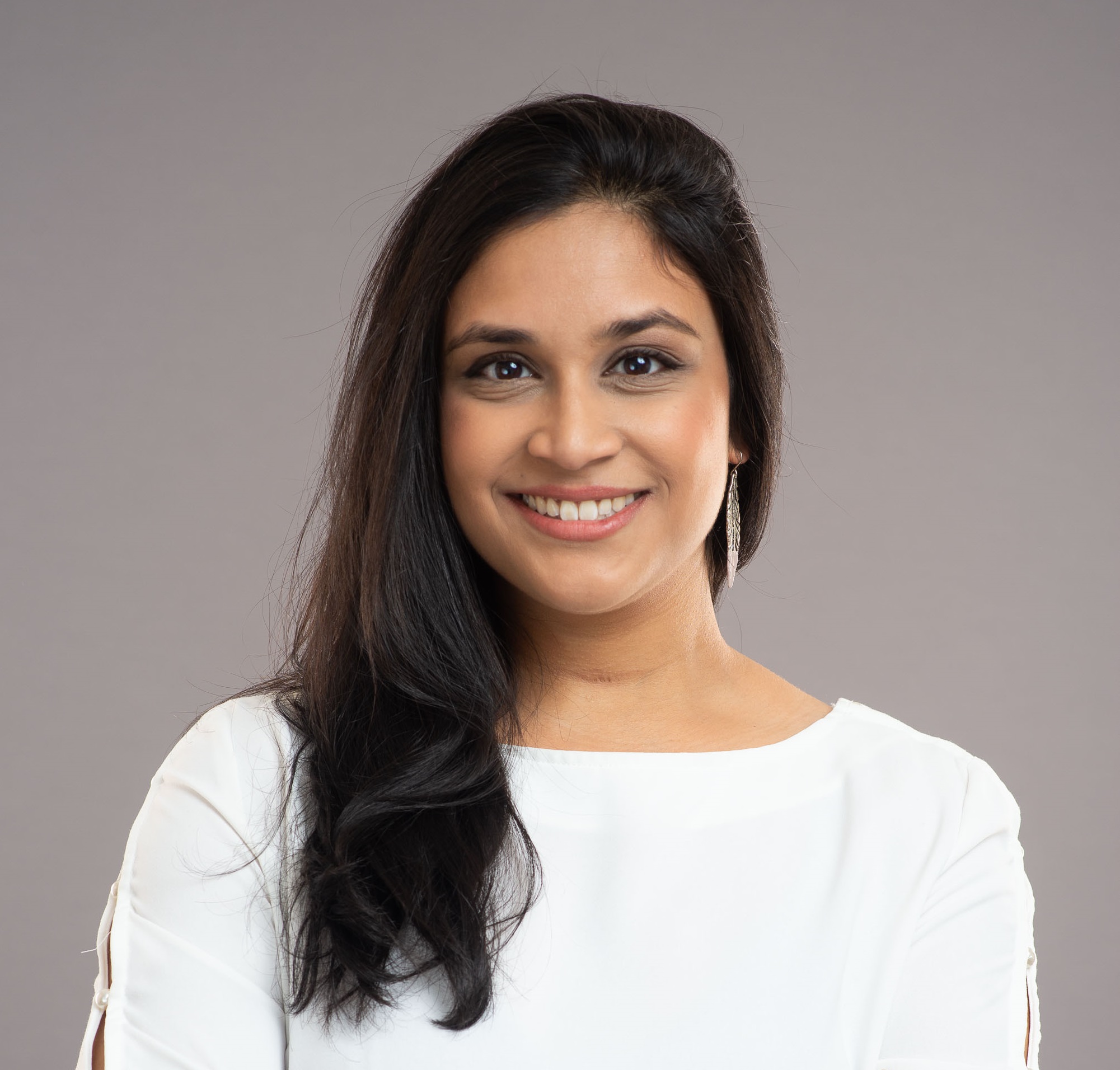 Headshot of Nadha Hassen